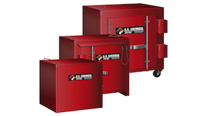Three bright red explosive storage magazines in small, medium, and large sizes