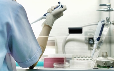 Doctor holding syringe in hospital