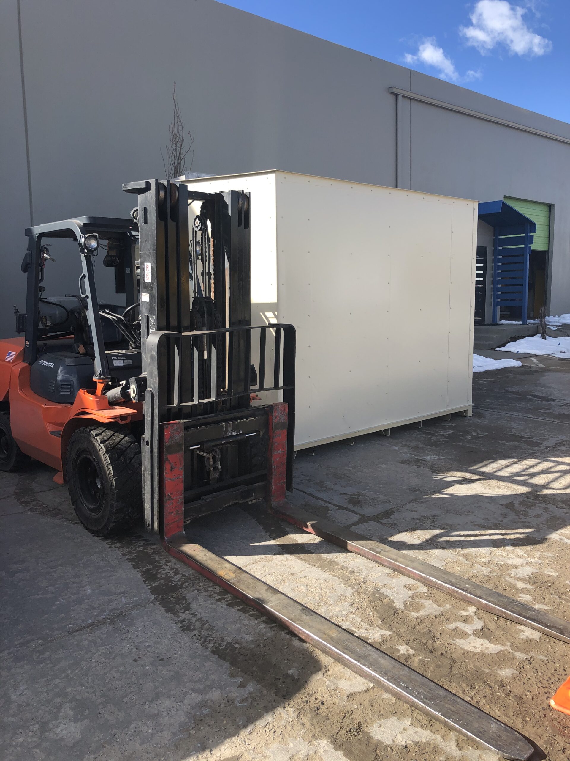 White Buffalo Hemp Company extraction building by US Chemical Storage being offloaded at the job site