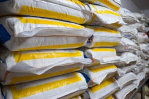 Bags of Agricultural Chemicals stacked in farming warehouse