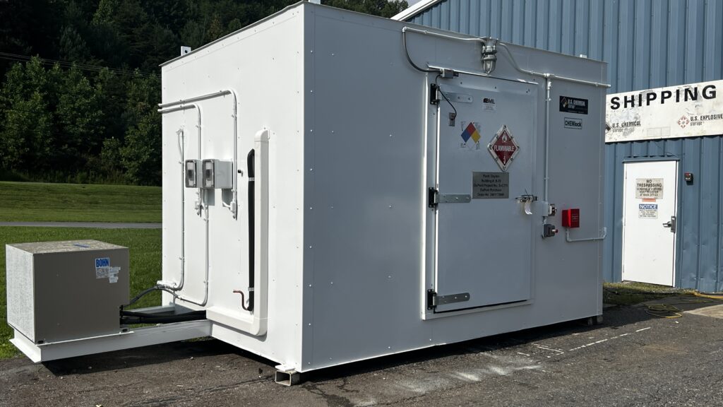 Exterior shot of white freezer building designed to hold temp of 10-degrees farenheit.