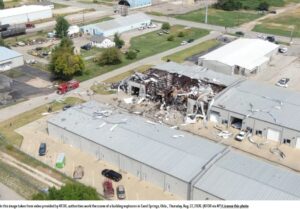 Oklahoma Sand Springs Cannabis Extraction Plant Explosion Aftermath - warehouse blown out ceiling and walls aerial view